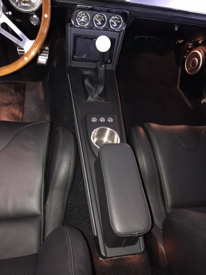 https://www.explicitcustoms.com/wp-content/uploads/2018/05/classic-ford-mustang-custom-center-console-and-trunk-subwoofer-installation-in-Melbourne-by-Explicit-Customs-5.jpg